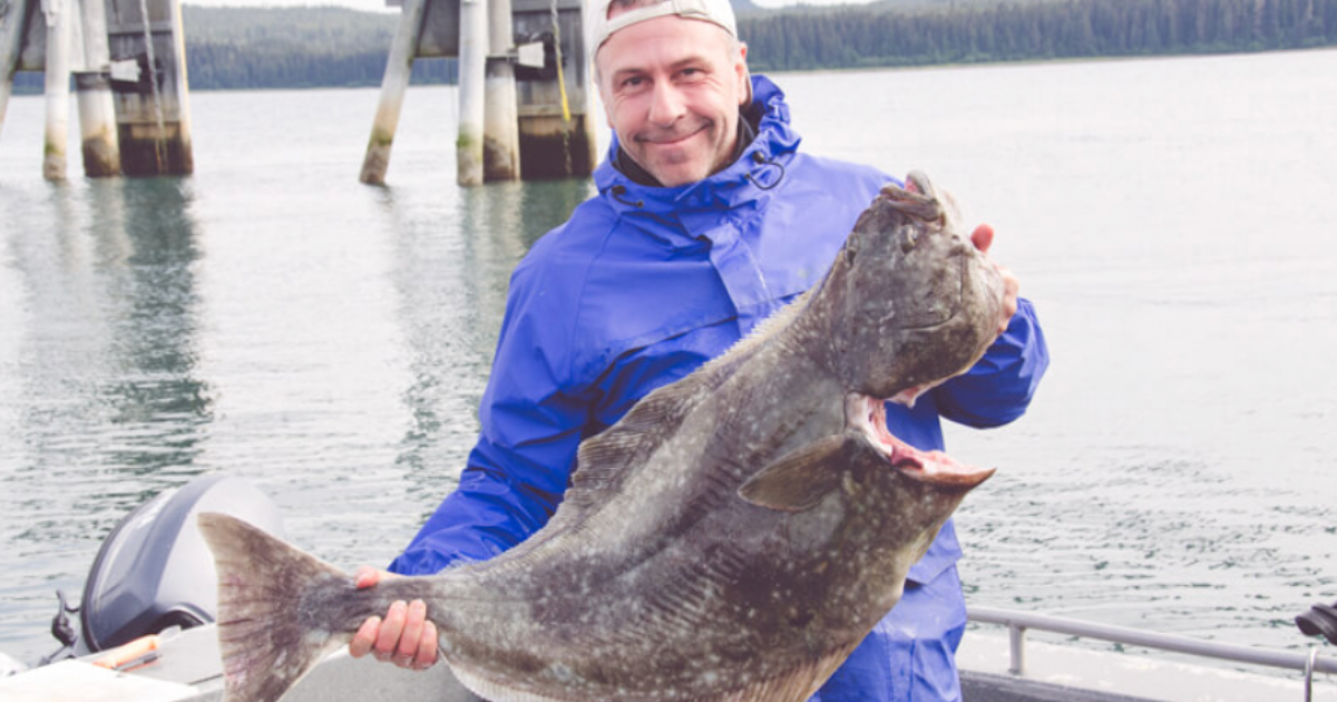 Guest, John, posing with his catches of the day with Alaskan Anglers. 
